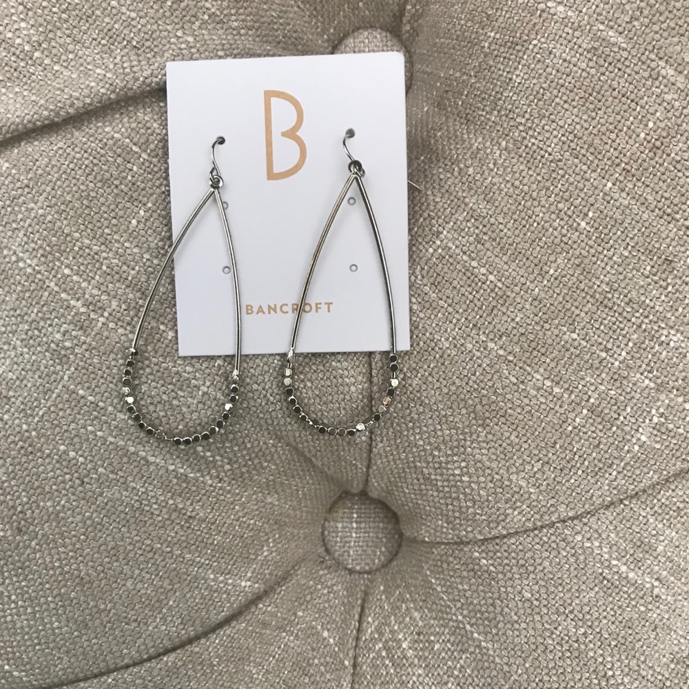 Silver oval beaded hoops